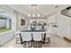 Modern dining room with white chairs and a blue runner at 676 Kimber Ln # 37, Debary, FL 32713