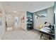 Upstairs hallway with a desk and window at 676 Kimber Ln # 37, Debary, FL 32713