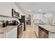 Kitchen features stainless steel appliances and granite countertops at 676 Kimber Ln # 37, Debary, FL 32713