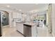 Modern kitchen with island, stainless steel appliances, and granite countertops at 676 Kimber Ln # 37, Debary, FL 32713