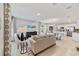 Open living room with comfortable seating and large TV at 676 Kimber Ln # 37, Debary, FL 32713