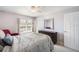 Simple bedroom with double bed and large window at 8321 Bella Vida Cir # 8321, Davenport, FL 33896
