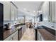 Modern kitchen with granite countertops and stainless steel appliances at 8321 Bella Vida Cir # 8321, Davenport, FL 33896