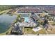 Community features a large pool, tennis courts, playground, and pond at 8876 Candy Palm Rd, Kissimmee, FL 34747