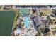 Community pool and recreation area with tennis court nearby at 8876 Candy Palm Rd, Kissimmee, FL 34747