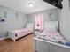 Charming bedroom with two twin beds, perfect for or guests at 8876 Candy Palm Rd, Kissimmee, FL 34747