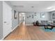 Bright hallway with light gray walls and wood-look flooring at 8876 Candy Palm Rd, Kissimmee, FL 34747