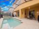 Relaxing backyard oasis with a private pool and patio at 8876 Candy Palm Rd, Kissimmee, FL 34747