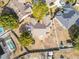 Bird's eye view of home and neighborhood, showcasing backyard at 933 El Lago Ter, Winter Springs, FL 32708