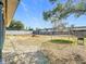 Large backyard with trampoline, firepit, and fenced area at 933 El Lago Ter, Winter Springs, FL 32708