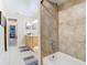 Clean bathroom with a bathtub and light tile at 933 El Lago Ter, Winter Springs, FL 32708