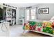 Bright bedroom with a white bed frame and colorful bedding at 933 El Lago Ter, Winter Springs, FL 32708