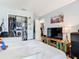 Spacious bedroom with a large bed, TV, and built-in closet at 933 El Lago Ter, Winter Springs, FL 32708