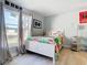 Bedroom featuring a bed, closet, and window with backyard view at 933 El Lago Ter, Winter Springs, FL 32708