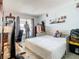 Bright bedroom with a large bed, gaming setup, and window views at 933 El Lago Ter, Winter Springs, FL 32708