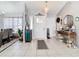 Welcoming entryway with white door, tile floors, and console table at 933 El Lago Ter, Winter Springs, FL 32708