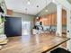 Kitchen boasts wood cabinets, stainless steel appliances, and butcher block countertops at 933 El Lago Ter, Winter Springs, FL 32708