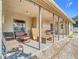 Covered patio with seating area and backyard view at 933 El Lago Ter, Winter Springs, FL 32708