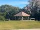 Community picnic area with covered gazebo and seating at 106 Madrid Dr # 106, Casselberry, FL 32707