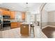 Updated kitchen with island and stainless steel appliances at 1175 Brentwood Dr, Clermont, FL 34711