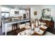 Modern kitchen with an island, stainless steel appliances, and white cabinets at 1212 Teal Creek Dr, St Cloud, FL 34769