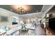 Spacious living room with an open floor plan and a large TV at 1212 Teal Creek Dr, St Cloud, FL 34769