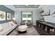 Bright playroom with built-in shelves and a comfortable sitting area at 1212 Teal Creek Dr, St Cloud, FL 34769