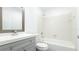Clean bathroom with gray vanity and shower/tub combo at 12162 Graduate Dr, Orlando, FL 32826