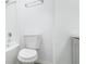 Updated bathroom with a gray vanity and white toilet and tub at 12162 Graduate Dr, Orlando, FL 32826
