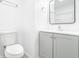 Updated bathroom with gray vanity, modern mirror, and shower at 12162 Graduate Dr, Orlando, FL 32826