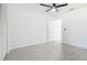 Bright bedroom with ceiling fan and tile floor at 12162 Graduate Dr, Orlando, FL 32826
