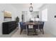 Elegant dining room with a live edge table and six chairs at 12162 Graduate Dr, Orlando, FL 32826