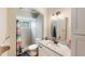 Updated bathroom with granite countertop vanity and shower at 1309 Paradise Ln, Winter Park, FL 32792