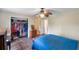 Bedroom with double bed, large closet, and wood flooring at 1309 Paradise Ln, Winter Park, FL 32792