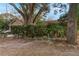 House with mature trees and landscaping at 1309 Paradise Ln, Winter Park, FL 32792