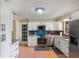 Modern kitchen with stainless steel appliances and granite countertops at 1309 Paradise Ln, Winter Park, FL 32792