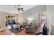Living room with view of backyard and partial bath view at 1309 Paradise Ln, Winter Park, FL 32792