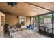 Relaxing screened porch with patio furniture and backyard view at 1309 Paradise Ln, Winter Park, FL 32792