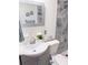 Cozy bathroom featuring a toilet and sink at 1801 Hage Way, Orlando, FL 32805