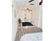 Relaxing bedroom with comfortable seating area and ceiling fan at 1801 Hage Way, Orlando, FL 32805