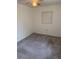 Simple bedroom with carpeted floor and ceiling fan at 1801 Hage Way, Orlando, FL 32805