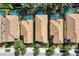 Aerial view of houses with tile roofs and pools at 1913 Nice Ct, Kissimmee, FL 34747