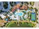 Aerial view of community pool, water features, and a basketball court at 1913 Nice Ct, Kissimmee, FL 34747