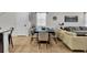 Open dining area with a large table and seating for eight at 1913 Nice Ct, Kissimmee, FL 34747