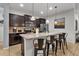Modern kitchen with island seating and stainless steel appliances at 1913 Nice Ct, Kissimmee, FL 34747