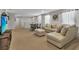 Open living area with sectional sofa, and TV at 1913 Nice Ct, Kissimmee, FL 34747