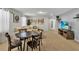 Living room with sectional sofa, round table and TV at 1913 Nice Ct, Kissimmee, FL 34747