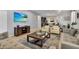 Spacious living area with comfortable seating and views to kitchen and dining area at 1913 Nice Ct, Kissimmee, FL 34747