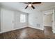 Simple bedroom with hardwood floors and white walls at 1913 Nw 12Th St, Ocala, FL 34475
