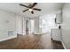 Spacious living area with hardwood floors and ceiling fan at 1913 Nw 12Th St, Ocala, FL 34475